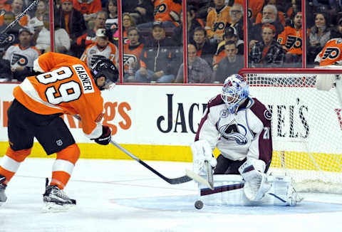 Nov 10, 2015; Philadelphia, PA, USA; Colorado Avalanche goalie Reto Berra (20) makes a save against Philadelphia Flyers center Sam Gagner during the second period at Wells Fargo Center. Mandatory Credit: Eric Hartline-USA TODAY Sports