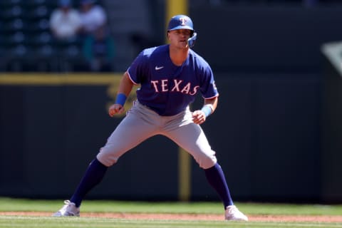 SEATTLE, WASHINGTON – MAY 10: Josh Jung #6 of the Texas Rangers leads off first base against the Seattle Mariners at T-Mobile Park on May 10, 2023 in Seattle, Washington. (Photo by Steph Chambers/Getty Images)