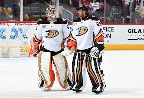 GLENDALE, AZ – OCTOBER 06: Goalies John Gibson #36 and Ryan Miller #30 of the Anaheim Ducks skate off the ice following a 1-0 victory against the Arizona Coyotes at Gila River Arena on October 6, 2018, in Glendale, Arizona. (Photo by Norm Hall/NHLI via Getty Images)