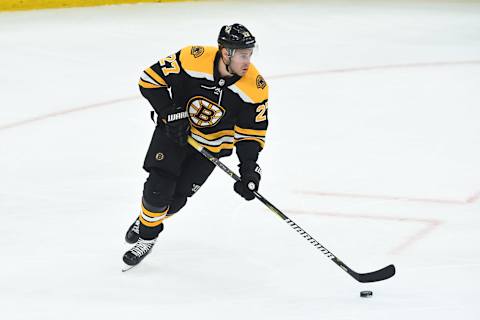 BOSTON, MA – APRIL 19: John Moore #27 of the Boston Bruins skates with the puck against the Toronto Maple Leafs in Game Five of the Eastern Conference First Round during the 2019 NHL Stanley Cup Playoffs at the TD Garden on April 19, 2019 in Boston, Massachusetts. (Photo by Steve Babineau/NHLI via Getty Images)