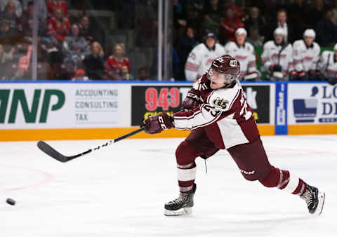 OSHAWA, ON – OCTOBER 20: Mason Mctavish #23 of the Peterborough Petes takes a shot during an OHL game against the Oshawa Generals at the Tribute Communities Centre on October 20, 2019 in Oshawa, Ontario, Canada. (Photo by Chris Tanouye/Getty Images)