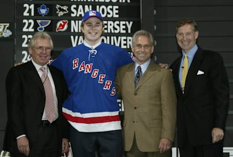 Glen Sather, first round draft pick (#12 overall), Hugh Jessiman, Tom Renney and Don Maloney of the New York Rangers . (Photo by Elsa/Getty Images/NHLI)