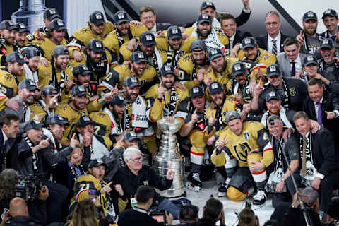 LAS VEGAS, NEVADA – JUNE 13: Team captain Mark Stone (C) #61 of the Vegas Golden Knights and teammates pose with the Stanley Cup after their 9-3 victory over the Florida Panthers in Game Five of the 2023 NHL Stanley Cup Final at T-Mobile Arena on June 13, 2023 in Las Vegas, Nevada. The Golden Knights won the series four games to one. (Photo by Ethan Miller/Getty Images)