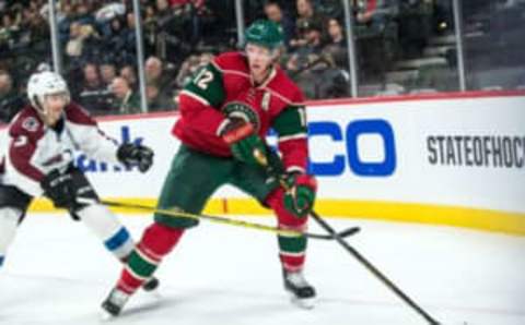 Sep 27, 2016; Saint Paul, MN, USA; Minnesota Wild forward Eric Staal (12) carries the puck during the second period of a preseason hockey game against the Colorado Avalanche at Xcel Energy Center. Mandatory Credit: Brace Hemmelgarn-USA TODAY Sports