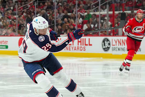 Oct 12, 2022; Raleigh, North Carolina, USA; Columbus Blue Jackets left wing Patrik Laine (29) scores a goal on his shot against the Carolina Hurricanes during the first period at PNC Arena. Mandatory Credit: James Guillory-USA TODAY Sports