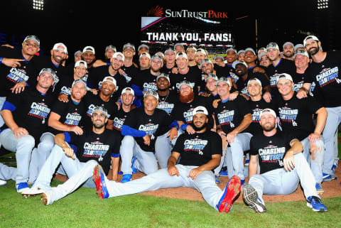 ATLANTA, GA – OCTOBER 08: The Los Angeles Dodgers pose together on the field after winning Game Four of the National League Division Series with a score of 6-2 over the Atlanta Braves at Turner Field on October 8, 2018 in Atlanta, Georgia. The Dodgers won the series 3-1. (Photo by Scott Cunningham/Getty Images)