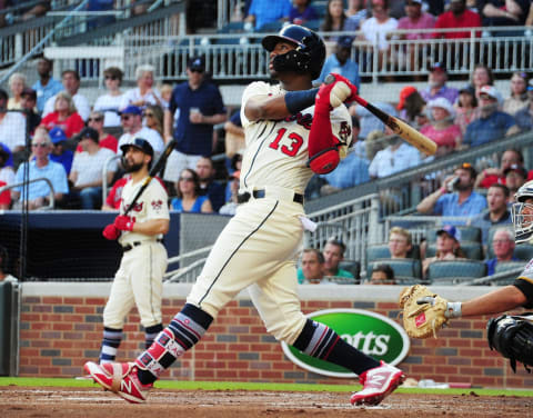 ATLANTA, GA – SEPTEMBER 2: Ronald Acuna, Jr. #13 of the Atlanta Braves hits a first inning solo home run against the Pittsburgh Pirates at SunTrust Park on September 2, 2018 in Atlanta, Georgia. (Photo by Scott Cunningham/Getty Images)