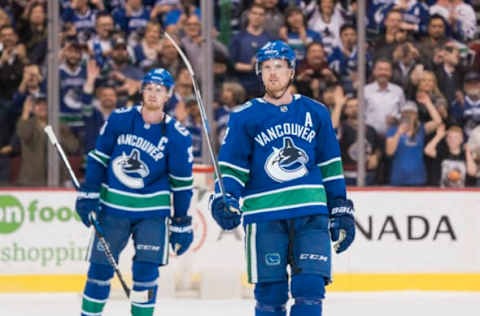 Daniel Sedin #22, Henrik Sedin #33, Vancouver Canucks (Photo by Rich Lam/Getty Images)