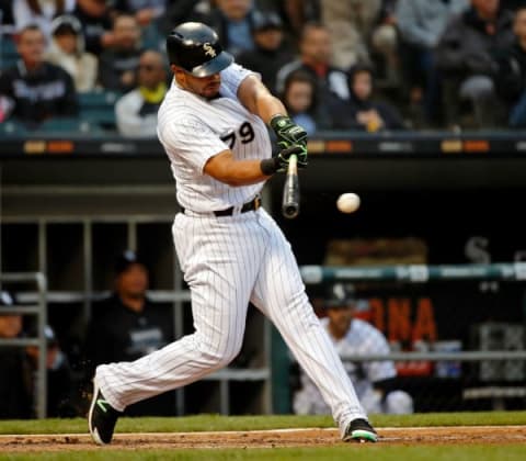 CHICAGO, IL – MAY 19: Jose Abreu #79 of the Chicago White Sox hits an RBI single against the Texas Rangers during the third inning at Guaranteed Rate Field on May 19, 2018, in Chicago, Illinois. (Photo by Jon Durr/Getty Images)