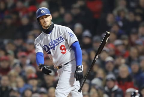 BOSTON, MA – OCTOBER 23: Yasmani Grandal #9 of the Los Angeles Dodgers draws a walk during the seventh inning against the Boston Red Sox in Game One of the 2018 World Series at Fenway Park on October 23, 2018 in Boston, Massachusetts. (Photo by Elsa/Getty Images)