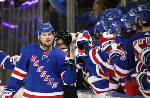 NEW YORK, NEW YORK – DECEMBER 05: Alexis Lafreniere #13 of the New York Rangers celebrates his game-winning goal against the St. Louis Blues at Madison Square Garden on December 05, 2022 in New York City. The Rangers defeated the Blues 6-4. (Photo by Bruce Bennett/Getty Images)