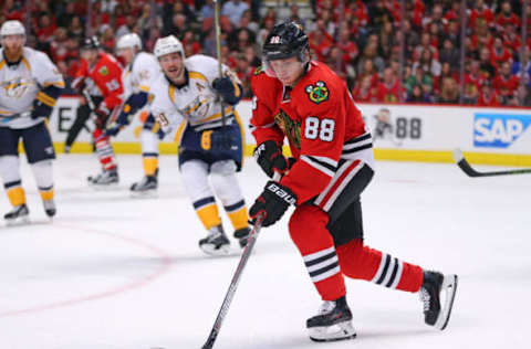 Apr 15, 2017; Chicago, IL, USA; Chicago Blackhawks right wing Patrick Kane (88) skates with Nashville Predators defenseman Roman Josi (59) defending during the first period in game two of the first round of the 2017 Stanley Cup Playoffs at United Center. Mandatory Credit: Dennis Wierzbicki-USA TODAY Sports