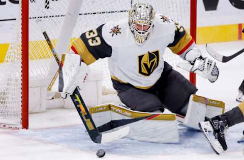 Mar 7, 2023; Sunrise, Florida, USA; Vegas Golden Knights goaltender Adin Hill (33) makes a save during the third period against the Florida Panthers at FLA Live Arena. Mandatory Credit: Sam Navarro-USA TODAY Sports