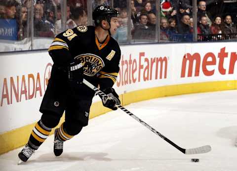 TORONTO – DECEMBER 19: Marc Savard #91of the Boston Bruins moves the puck during the game against the Toronto Maple Leafs on December 19, 2009 at the Air Canada Centre in Toronto, Ontario, Canada. (Photo by Abelimages/Getty Images)