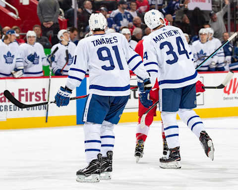 DETROIT, MI – OCTOBER 11: John Tavares #91 and Auston Matthews #34 of the Toronto Maple Leafs skate towards the bench during an NHL game against the Detroit Red Wings at Little Caesars Arena on October 11, 2018 in Detroit, Michigan. The Leafs defeated the Wings 5-3. (Photo by Dave Reginek/NHLI via Getty Images)