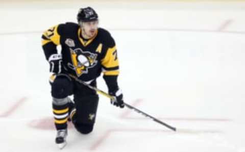 Pittsburgh Penguins center Evgeni Malkin (71) looks on in Penguins black and yellow (Charles LeClaire-USA TODAY Sports)