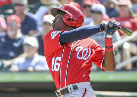 JUPITER, FL – FEBRUARY 24: Washington Nationals outfielder Victor Robles (16) watches his pop fly that scored Wilmer Difo (1) after a Miami Marlins error during first inning action at Roger Dean Stadium. (Photo by Jonathan Newton/The Washington Post via Getty Images)