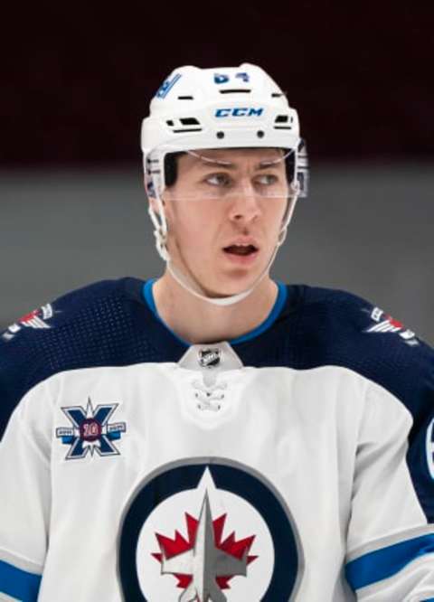 Logan Stanley #64, Winnipeg Jets. (Photo by Rich Lam/Getty Images)