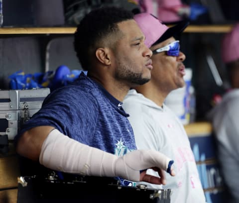 DETROIT, MI – MAY 13: Robinson Cano #22 of the Seattle Mariners sits on the bench with his right hand in a cast after getting hit on the hand and leaving the game against the Detroit Tigers during the third inning at Comerica Park on May 13, 2018, in Detroit, Michigan. (Photo by Duane Burleson/Getty Images)