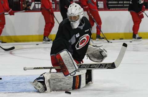 RALEIGH, NC – JUNE 28: Carolina Hurricanes Goalie Eetu Makiniemi (60) deflects the puck away during the Carolina Hurricanes Development Camp on June 28, 2017 at the PNC Arena in Raleigh, NC. (Photo by Greg Thompson/Icon Sportswire via Getty Images)