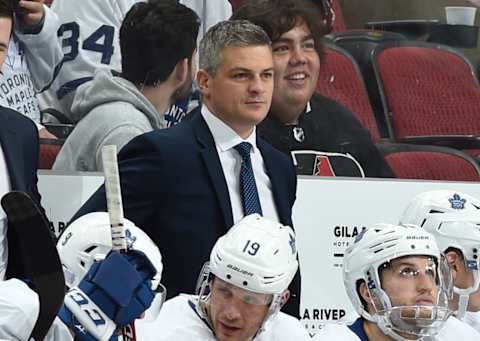 GLENDALE, ARIZONA - NOVEMBER 21: Head coach Sheldon Keefe of the Toronto Maple Leafs looks on from the bench during a game against the Arizona Coyotes at Gila River Arena on November 21, 2019 in Glendale, Arizona. The game was Keefe's first game as an NHL head coach. (Photo by Norm Hall/NHLI via Getty Images)