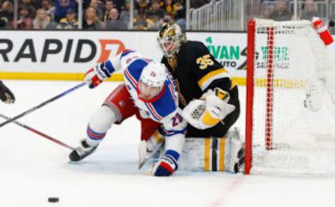 BOSTON, MA – MARCH 4: Linus Ullmark #35 of the Boston Bruins collides with Chris Kreider #20 of the New York Rangers during the second period at the TD Garden on March 4, 2023, in Boston, Massachusetts. (Photo by Richard T Gagnon/Getty Images)