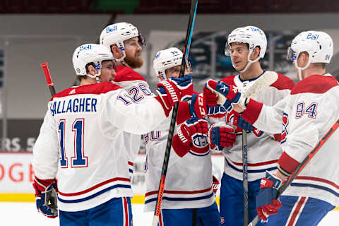 VANCOUVER, BC – MARCH 08: Jeff Petry #26 of the Montreal Canadiens celebrates with teammates Brendan Gallagher #11, Tomas Tatar #90, Jesperi Kotkaniemi #15 and Correy Perry #94 after scoring a goal against the Vancouver Canucks during the first period at Rogers Arena on March 8, 2021 in Vancouver, Canada. (Photo by Rich Lam/Getty Images)