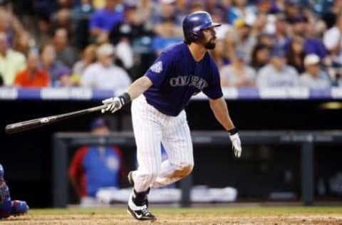 Jul 20, 2013; Denver, CO, USA; first baseman Todd Helton (17) spent parts of 17 seasons, his entire MLB career, in a Rockies uniform. Mandatory Credit: Chris Humphreys-USA TODAY Sports