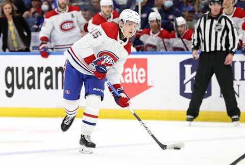 Dec 28, 2021; Tampa, Florida, USA; Montreal Canadiens defenseman Sami Niku (15) passes the puck against the Tampa Bay Lightning during the second period at Amalie Arena. Mandatory Credit: Kim Klement-USA TODAY Sports