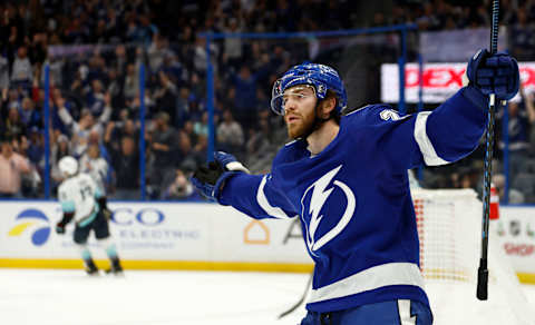 TAMPA, FLORIDA – DECEMBER 13: Brayden Point #21 of the Tampa Bay Lightning celebrates a goal in the second period during a game against the Seattle Kraken at Amalie Arena on December 13, 2022 in Tampa, Florida. (Photo by Mike Ehrmann/Getty Images)