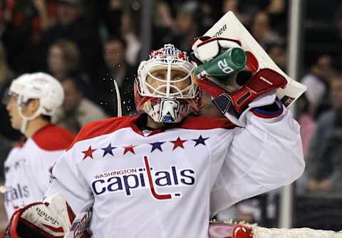 WINNIPEG, CANADA – MARCH 16: Goaltender Tomas Vokoun #29 of the Washington Capitals squirts water on his face during a break in the action in a game against the Winnipeg Jets in NHL action at the MTS Centre on March 16, 2012 in Winnipeg, Manitoba, Canada. (Photo by Marianne Helm/Getty Images)