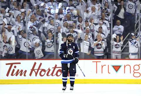 Dustin Byfuglien of the Winnipeg Jets celebrates his first goal against the Nashville Predators in Game Three of the Western Conference Second Round during the 2018 NHL Stanley Cup Playoffs on May 1, 2018.