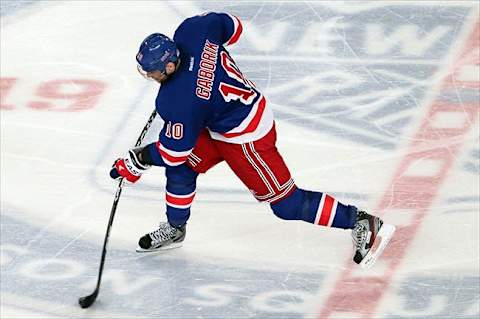 May 12 2012; New York, NY, USA; New York Rangers right wing Marian Gaborik (10) shoots during the third period against the Washington Capitals in game seven in the Eastern Conference semifinals of the 2012 Stanley Cup Playoffs at Madison Square Garden. Rangers won 2-1. Mandatory Credit: Anthony Gruppuso-USA TODAY Sports