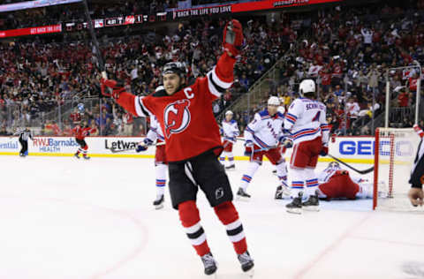 NEWARK, NEW JERSEY – MAY 01: Nico Hischier #13 of the New Jersey Devils celebrates a second-period goal by Tomas Tatar #90 against Igor Shesterkin #31 of the New York Rangers in Game Seven of the First Round of the 2023 Stanley Cup Playoffs at Prudential Center on May 01, 2023, in Newark, New Jersey. (Photo by Bruce Bennett/Getty Images)