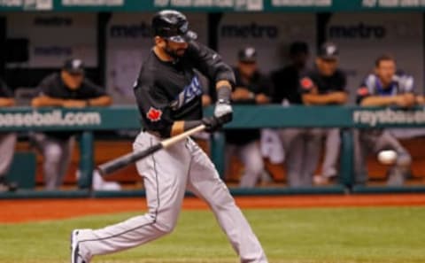 ST. PETERSBURG, FL – SEPTEMBER 25: Outfielder Jose Bautista #19 of the Toronto Blue Jays fouls off a pitch against the Tampa Bay Rays during the game at Tropicana Field on September 25, 2011 in St. Petersburg, Florida. (Photo by J. Meric/Getty Images)