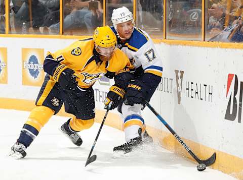 NASHVILLE, TN – NOVEMBER 10: Ryan Ellis #4 of the Nashville Predators battles for the puck against Jaden Schwartz #17 of the St. Louis Blues during an NHL game at Bridgestone Arena on November 10, 2016 in Nashville, Tennessee. (Photo by John Russell/NHLI via Getty Images)