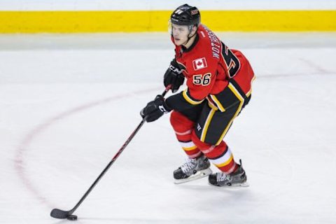 Mar 24, 2014; Calgary, Alberta, CAN; Calgary Flames defenseman Tyler Wotherspoon (56) skates with the puck against the San Jose Sharks during the third period at Scotiabank Saddledome. Calgary Flames won 2-1 in the shootout. Mandatory Credit: Sergei Belski-USA TODAY Sports