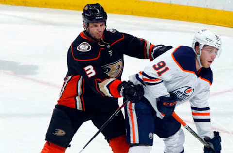 ANAHEIM, CA – FEBRUARY 9: Kevin Bieksa #3 of the Anaheim Ducks battles for position against Drake Caggiula #91 of the Edmonton Oilers during the game on February 9, 2018. (Photo by Debora Robinson/NHLI via Getty Images)