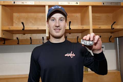 OTTAWA, ON – DECEMBER 29: Tyler Lewington #78 of the Washington Capitals poses with the puck with which he scored his first career NHL goal in a game against the Ottawa Senators at Canadian Tire Centre on December 29, 2018 in Ottawa, Ontario, Canada. (Photo by Andre Ringuette/NHLI via Getty Images)