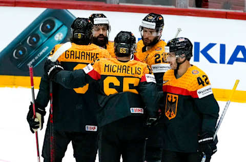 HELSINKI, FINLAND - MAY 20: Germany squad celebrates during the 2022 IIHF Ice Hockey World Championship match between Germany and Italy at Helsinki Ice Hall on May 20, 2022 in Helsinki, Finland. (Photo by Jari Pestelacci/Eurasia Sport Images/Getty Images)