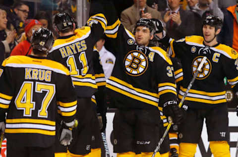 NHL Power Rankings: Boston Bruins center Patrice Bergeron (37) and defenseman Zdeno Chara (33) congratulate teammates after their 4-0 win over the Montreal Canadiens at TD Garden. Mandatory Credit: Winslow Townson-USA TODAY Sports