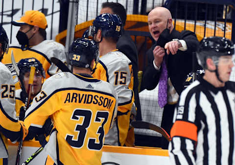 Nashville Predators head coach John Hynes (top, right) Mandatory Credit: Christopher Hanewinckel-USA TODAY Sports