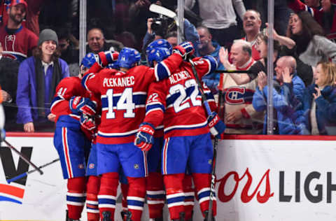 MONTREAL, QC – JANUARY 07: Members of the Montreal Canadiens celebrate a third period goal by Brendan Gallagher