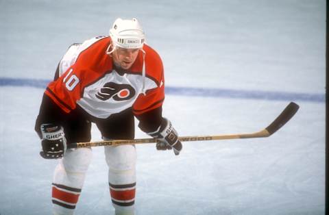 LANDOVER, MD – JANUARY 28: John LeClair #10 of the Philadelphia Flyers looks on during warm-ups prior to a NHL hockey game against the Washington Capitals on January 28, 1996 at the USAir Arena in Landover, Maryland. (Photo by Mitchell Layton/Getty Images)