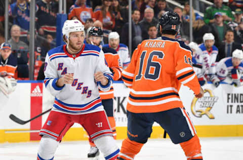 EDMONTON, AB – MARCH 11: Jujhar Khaira #16 of the Edmonton Oilers drops his gloves to fight Brendan Lemieux #48 of the New York Rangers on March 11, 2019 at Rogers Place in Edmonton, Alberta, Canada. (Photo by Andy Devlin/NHLI via Getty Images)