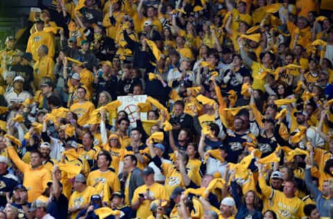 Jun 11, 2017; Nashville, TN, USA; Nashville Predators fans cheer against the Pittsburgh Penguins during the first period in game six of the 2017 Stanley Cup Final at Bridgestone Arena. Mandatory Credit: Christopher Hanewinckel-USA TODAY Sports