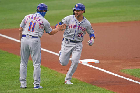 Sep 2, 2020; Baltimore, Maryland, USA; New York Mets outfielder Michael Conforto (30) is greeted by coach Tony DeFrancesco (11) following his two run home run in the first inning against the Baltimore Orioles at Oriole Park at Camden Yards. Mandatory Credit: Mitch Stringer-USA TODAY Sports