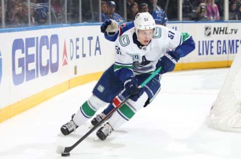 NEW YORK, NY – OCTOBER 20: Troy Stecher #51 of the Vancouver Canucks skates with the puck against the New York Rangers at Madison Square Garden on October 20, 2019 in New York City. (Photo by Jared Silber/NHLI via Getty Images)