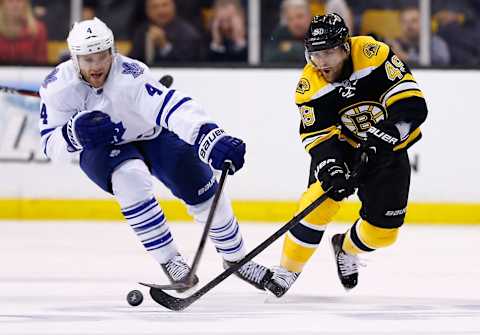 BOSTON, MA – MAY 13: Rich Peverley #49 of the Boston Bruins and Cody Franson #4 of the Toronto Maple Leafs . (Photo by Jared Wickerham/Getty Images)