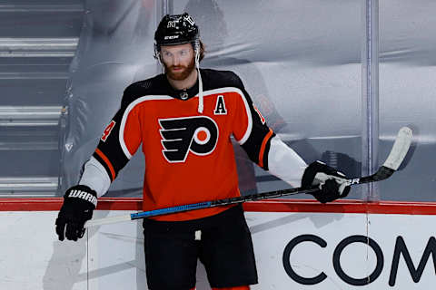 The Flyers’ Sean Couturier looks on before playing against the New York Rangers. (Photo by Tim Nwachukwu/Getty Images)